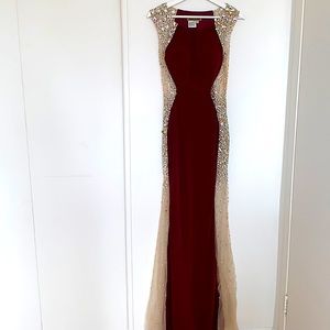A burgundy prom dress